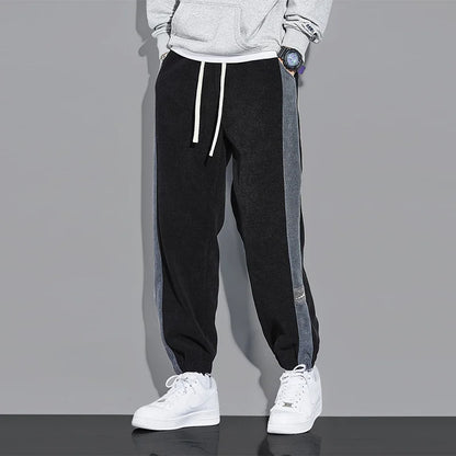 Joggers i vintage kordfløyel med kontrastfargede striper