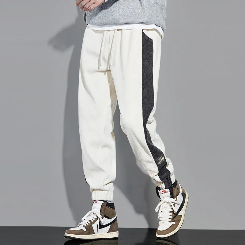 Joggers i vintage kordfløyel med kontrastfargede striper