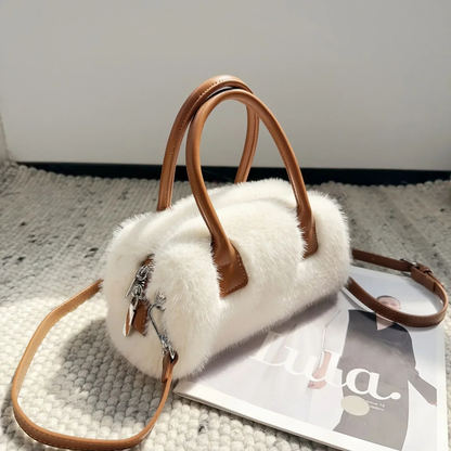 Pixie | Skulderveske i fuskepels med topphank og skinnkant