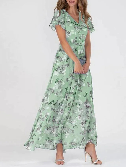 Rosette | Elegant maxikjole i chiffon med blomster og flagreermer
