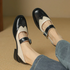 Roxie | Totonede Mary Jane-hæler i skinn med wingtip-brogue – Svart
