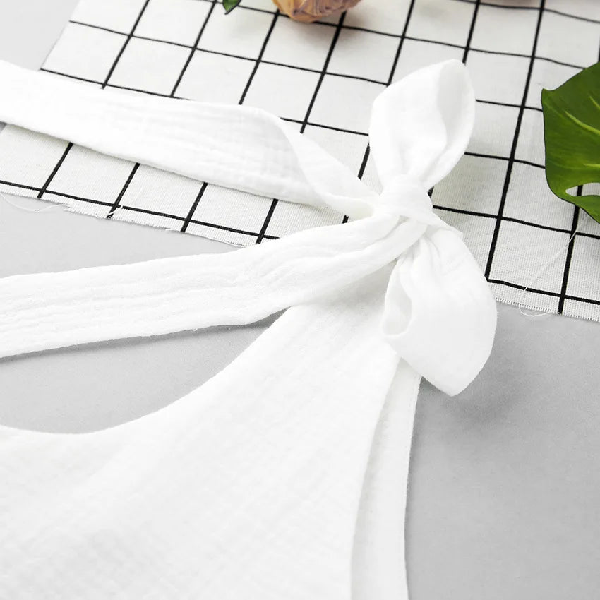 Elegant todelt sett med struktur og ermer med sløyfe