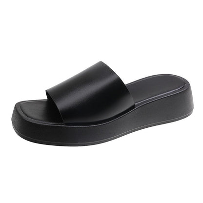 Minimalistiske slidesandaler med bred rem