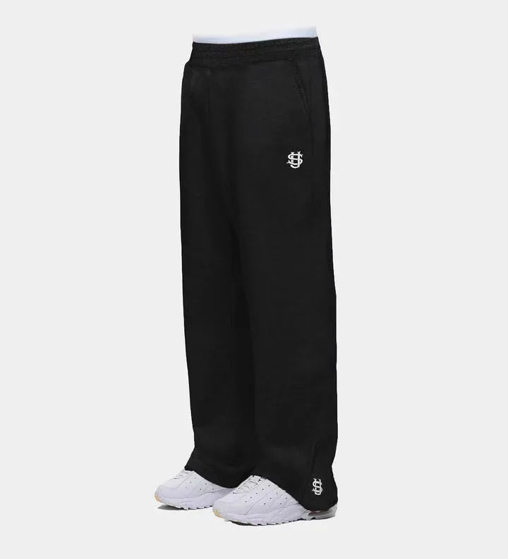Trendy Joggebukser for Menn og Kvinner – Løse Wide Leg Sweatpants med Brodert Logo og Lommer | Streetwear &amp; Komfort i Ett