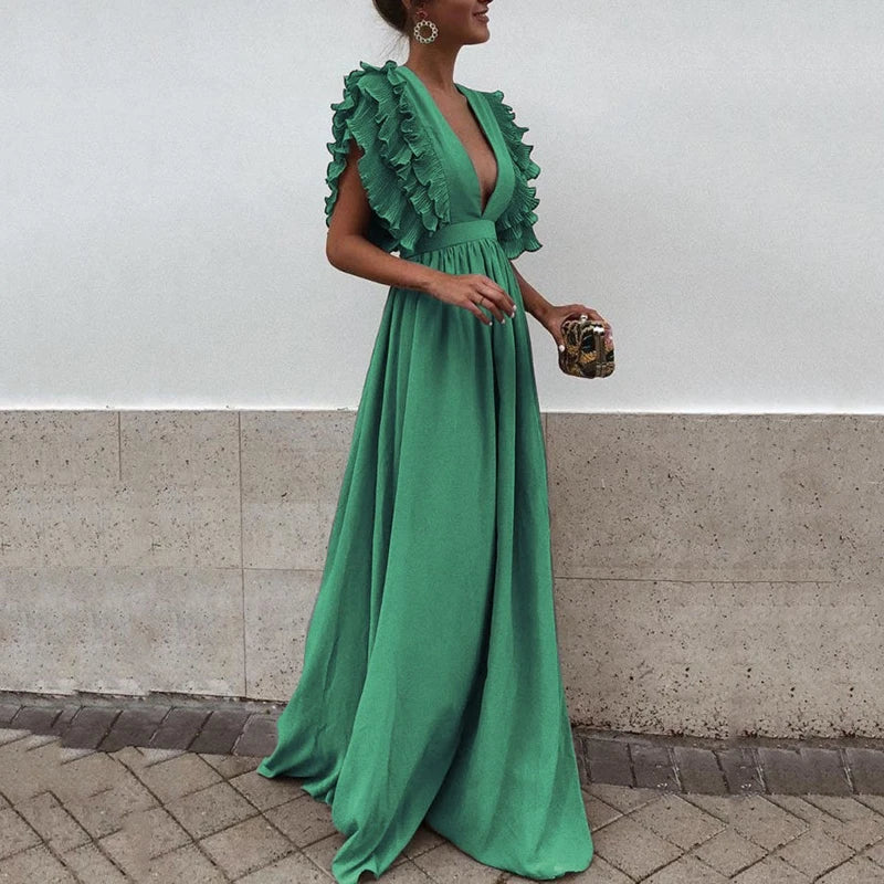 Elegant kjole med rynkede ermer