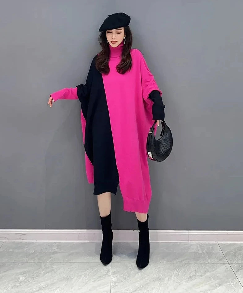 Ujevn eleganse: Oversized høyhalset batwing-strikkekjole