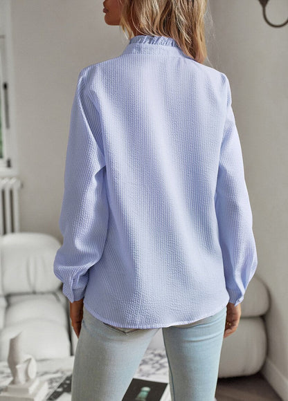 Elegant skjorte med volanger