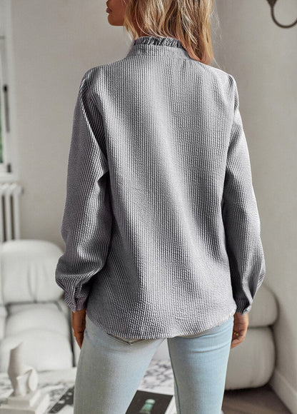 Elegant skjorte med volanger