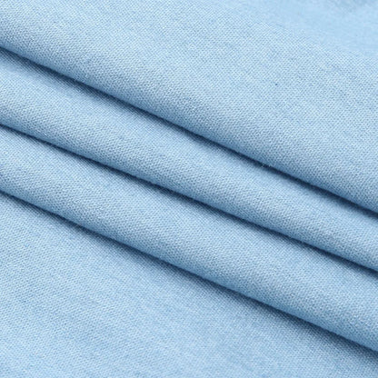 Minikjole i denim uten skuldre med overdimensjonert volang