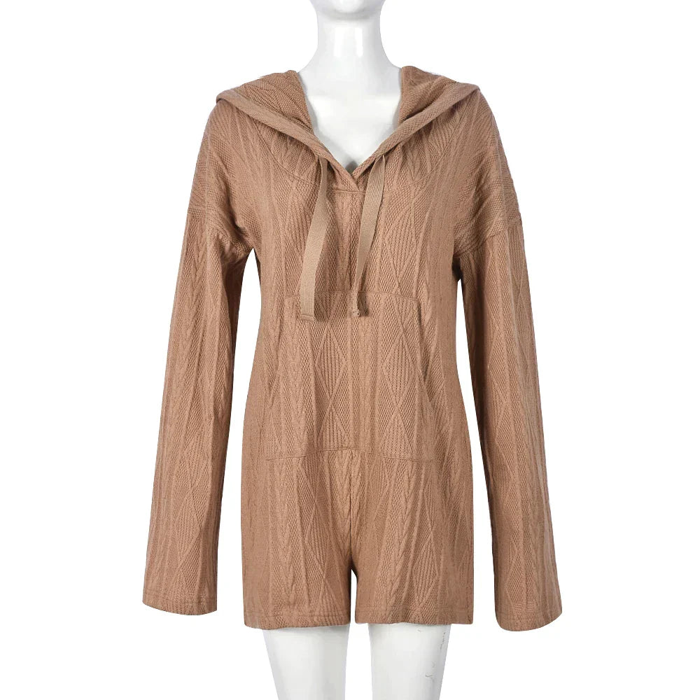 Strukturert jumpsuit med hette og lommer foran