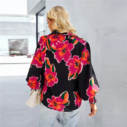 Elegant bluse med knute foran