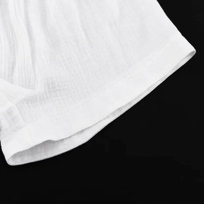 Løstsittende sett med strukturert bluse og shorts