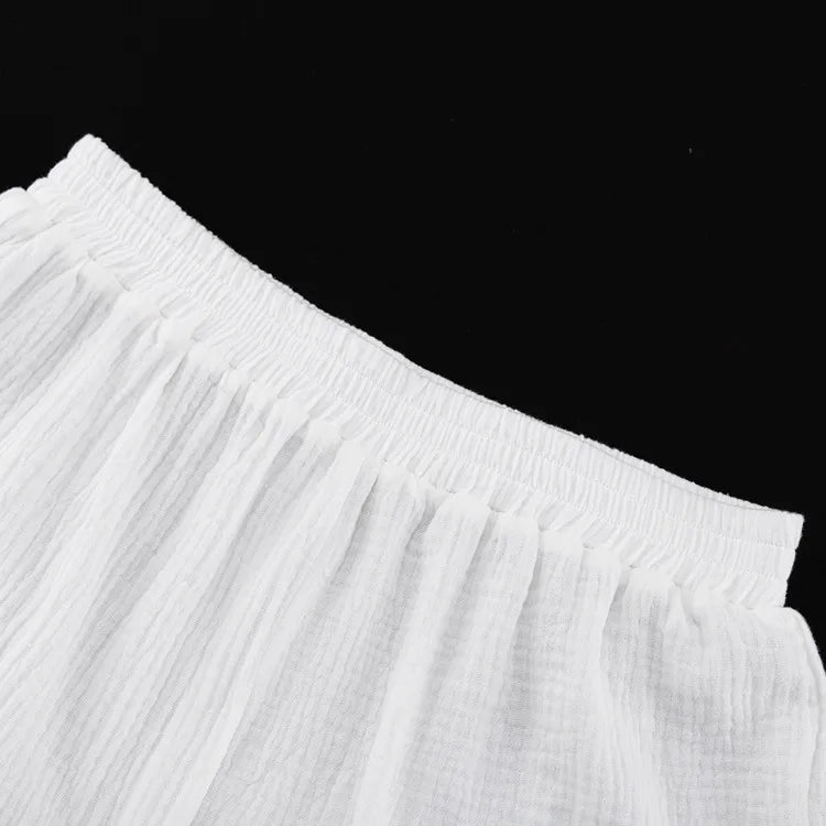 Løstsittende sett med strukturert bluse og shorts
