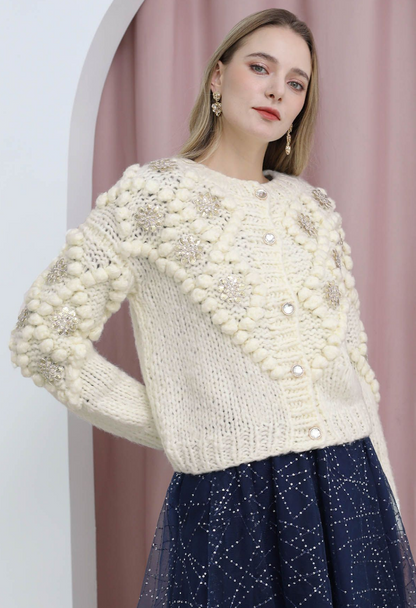 Paillettblomstret pom-pom strikkejakke