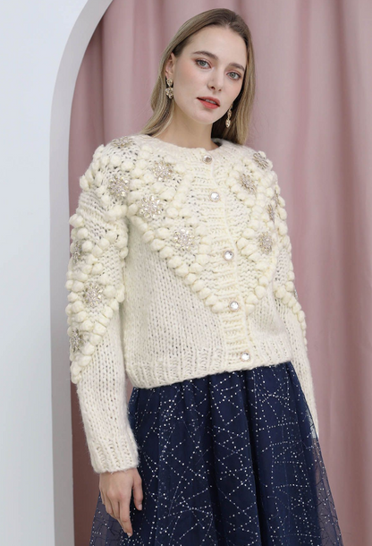 Paillettblomstret pom-pom strikkejakke