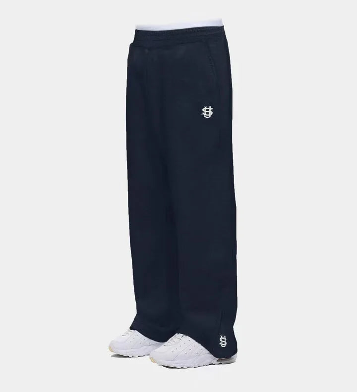 Trendy Joggebukser for Menn og Kvinner – Løse Wide Leg Sweatpants med Brodert Logo og Lommer | Streetwear &amp; Komfort i Ett