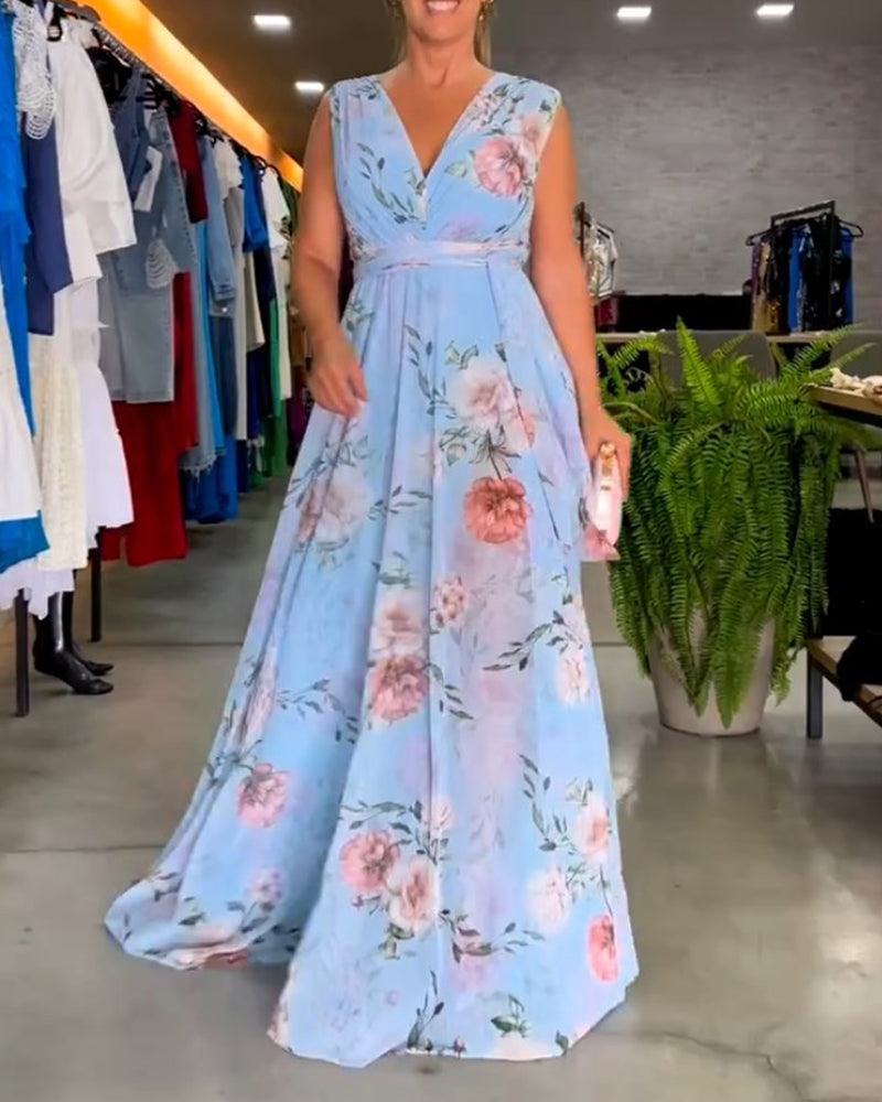 Seraphine | Ermeløs maxikjole i chiffon med blomstermønster og V-hals – Lyseblå
