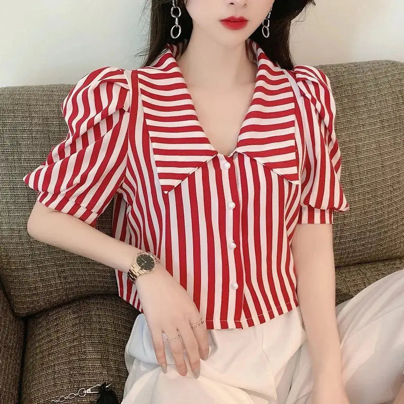 Vintagebluse med striper og puffermer