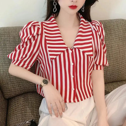 Vintagebluse med striper og puffermer