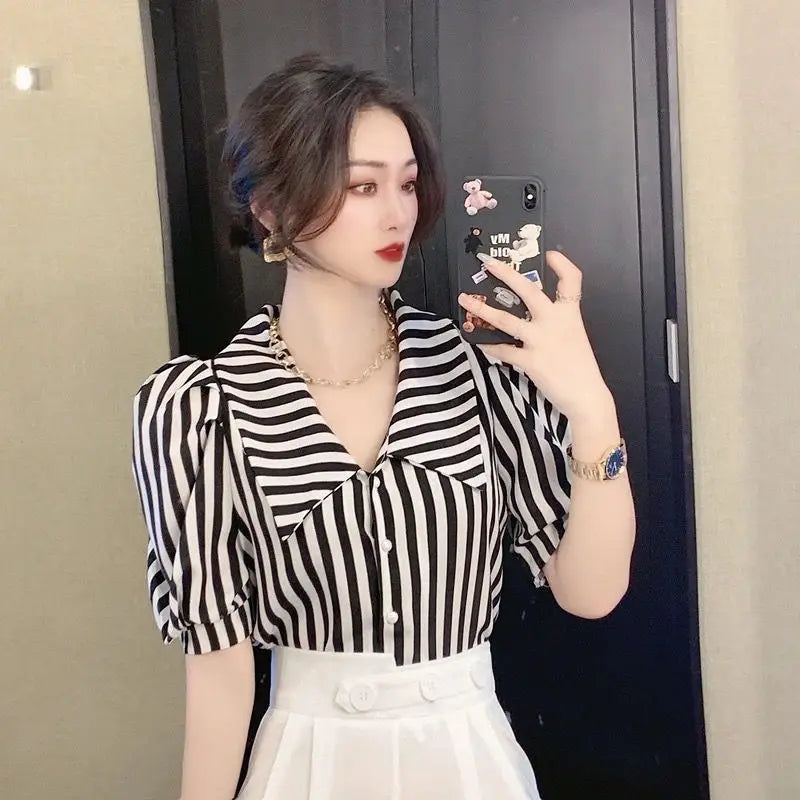 Vintagebluse med striper og puffermer