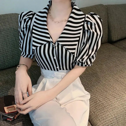 Vintagebluse med striper og puffermer