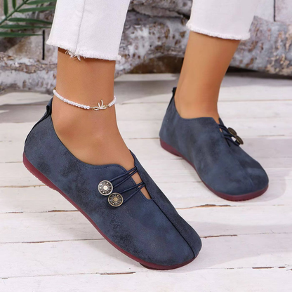 Tatum | Flate slip-on-sko i semsket skinn med kryssnøring og knapper