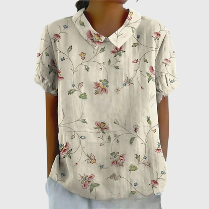 Thea | Kortermet bluse i lin med blomstermønster og krage