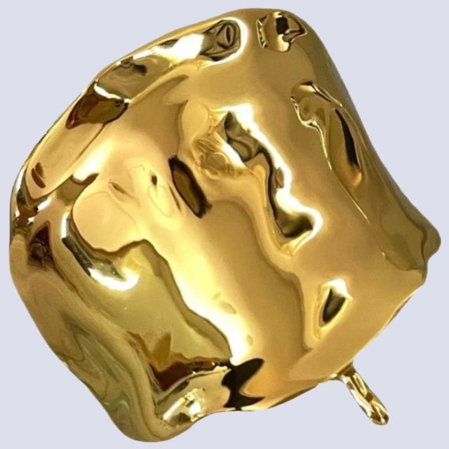 Hårbånd i metall med skulpturelt design