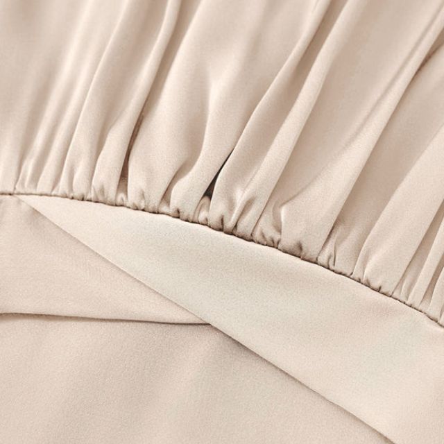 Plissert jumpsuit med justerbare stropper