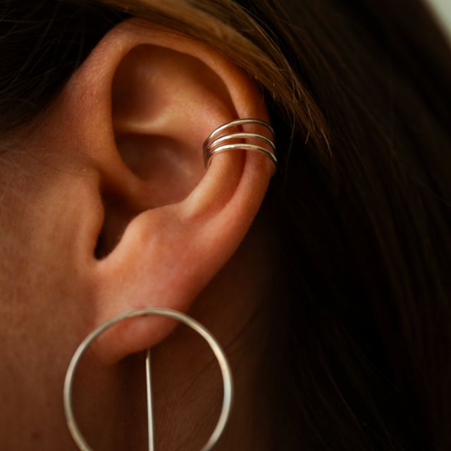 Spiralformet øremansjett med skinnende overflate