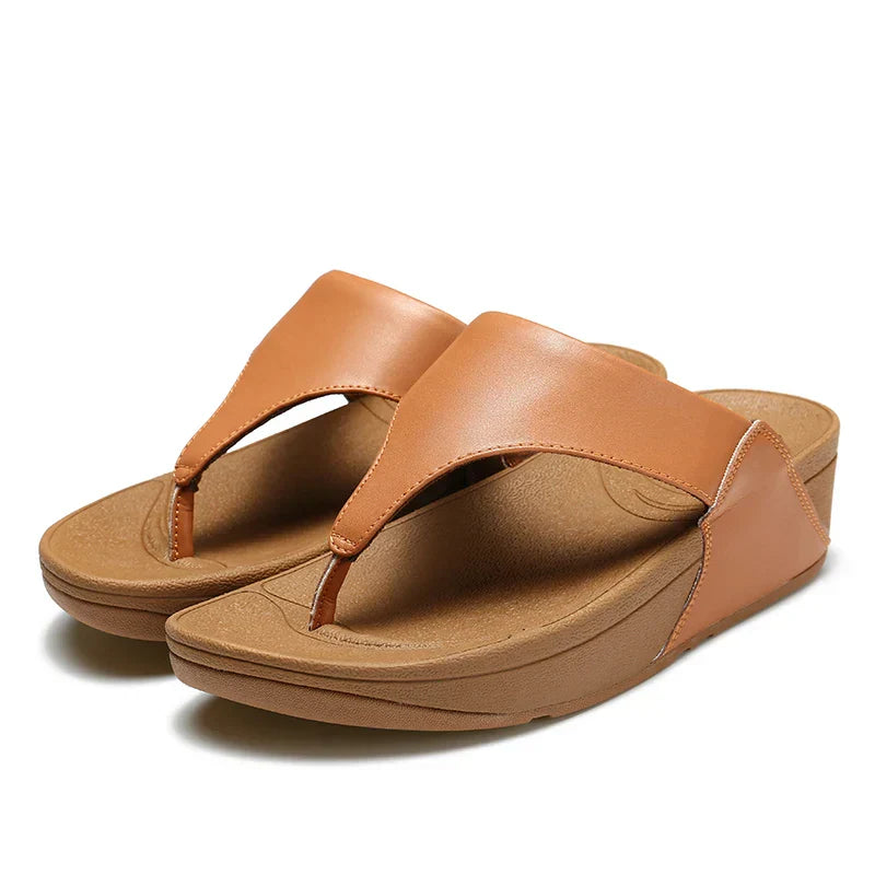 Skinnsandaler for kvinner