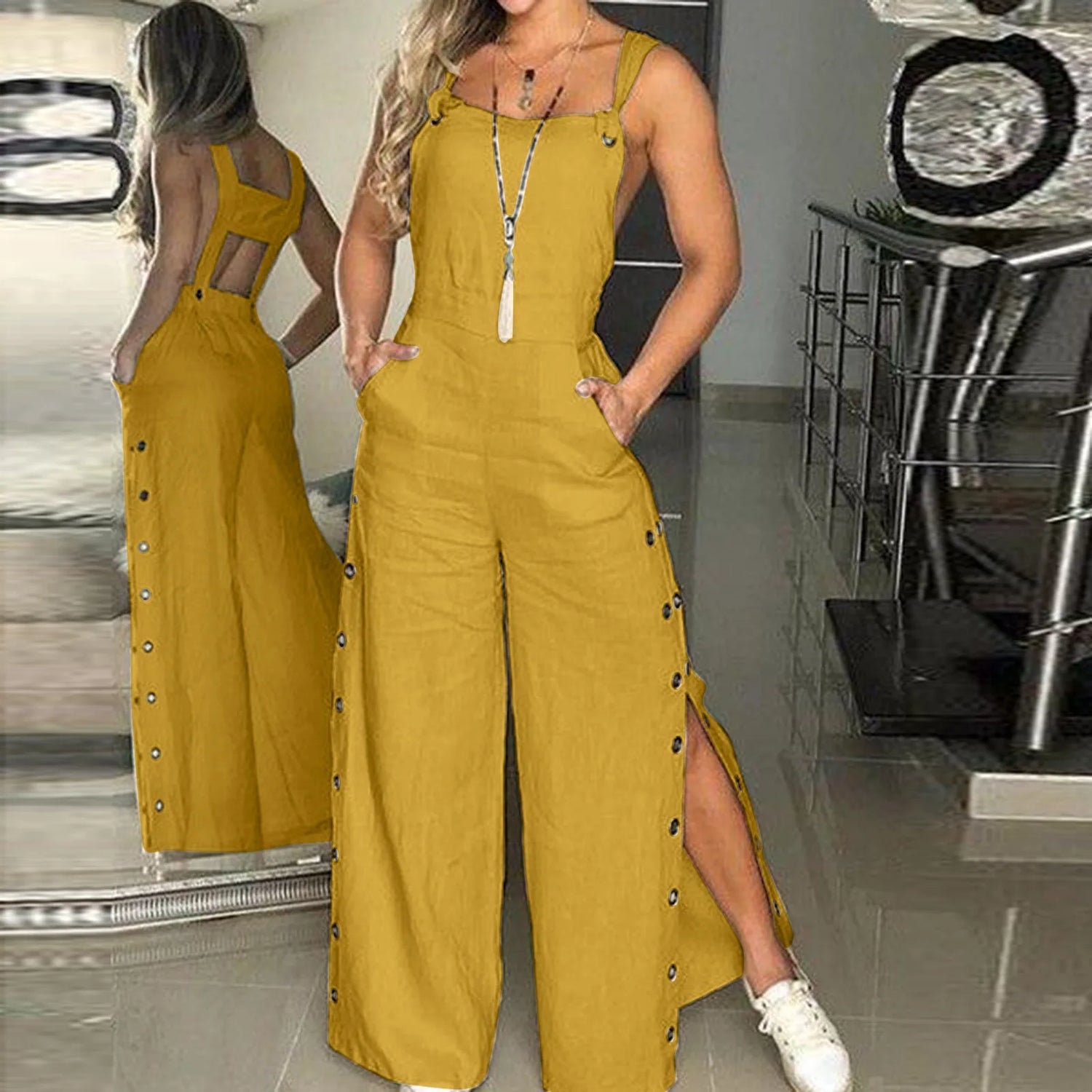 Sommerlig jumpsuit med ermeløse, snodde knuter og lommer