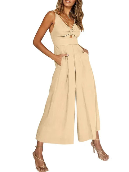 Elegant ermeløs jumpsuit med vide ben