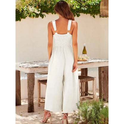 Elegant ermeløs jumpsuit med vide ben