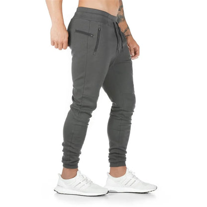 Skinny joggebukse med flere lommer og elastisk midje for menn