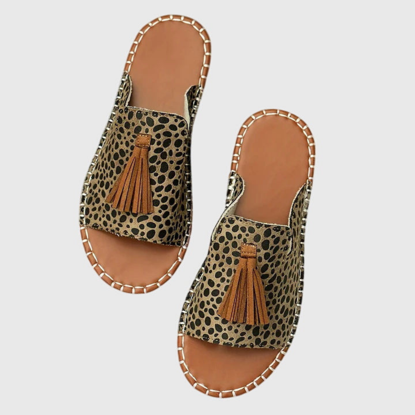 Zuri | Flate slip-in-sandaler i lerret med bohemsk mønster og dusk