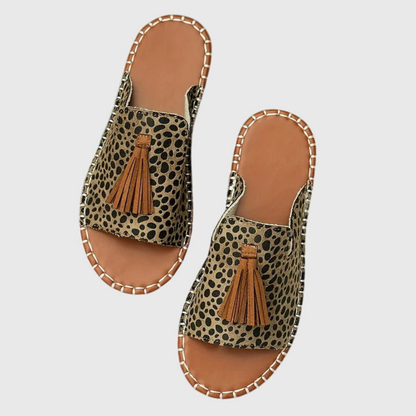 Zuri | Flate slip-in-sandaler i lerret med bohemsk mønster og dusk