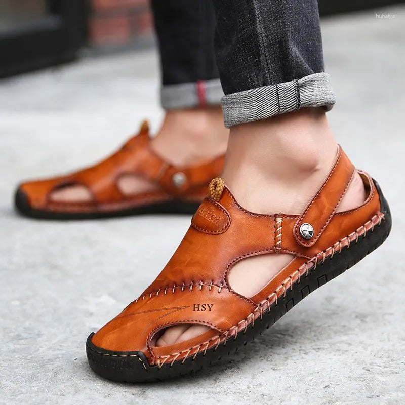 Håndlagde loafers i skinn med syningsdetaljer