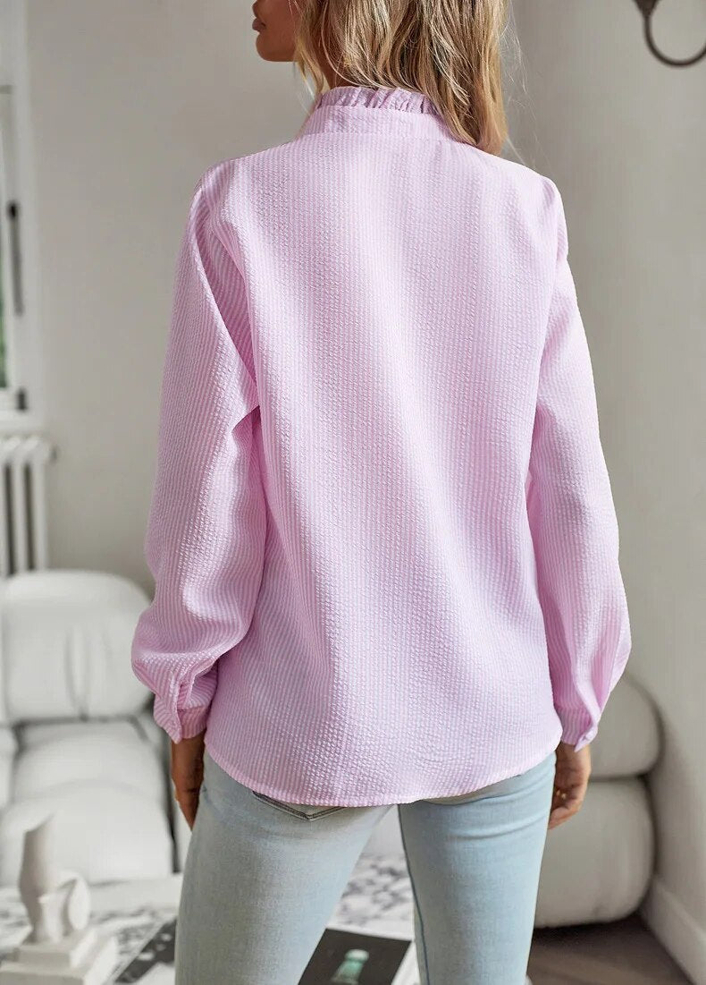 Elegant bluse med lange ermer